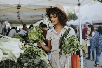 Women shopping at the local farmers market for vegetables at Addison Ranch Apartments, Petaluma, 94954